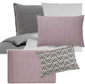 zwei Bettwäschensets in unterschiedlichen Grautönen, ein Mauve farbenes Dekokissen und eine Decke