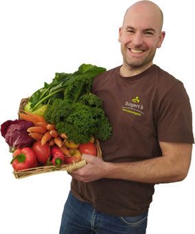 Felix Burgert verkauft Gemüse auf dem Münstermarkt