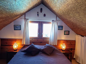 Mezzanine bedroom 1, bungalow No.9 – double bed 140×200, timber frame, closets, fan