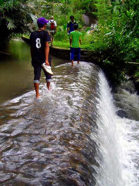 people crossing a river