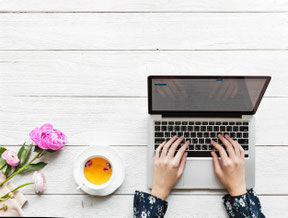 Woman booking her first online therapy session with Infinitum Therapy