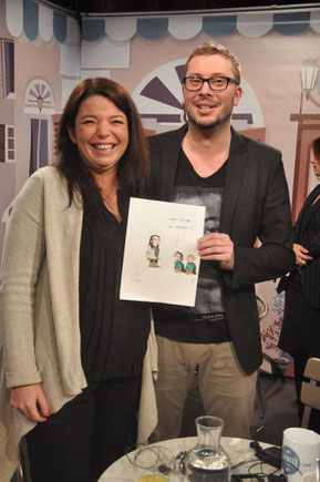 Photo souvenir avec l'auteur de la caricature, Julien Osty.