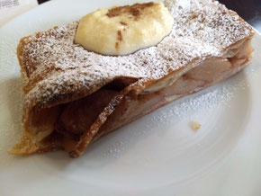 Traditional Romanian sweet pie with apples and raisins, Lente Lupu Dionisie. Bucharest, Romania