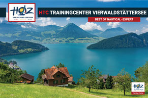 Panorama Vierwaldstättersee mit Hügeln, Dörfern und Bergen, Häuser im Vordergrund – Standort HOZ HTC Trainingcenter Vierwaldstättersee.