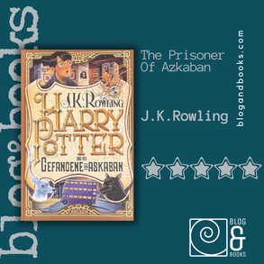 Book cover of the Prisone of Azkaban on top of a blue piece of material