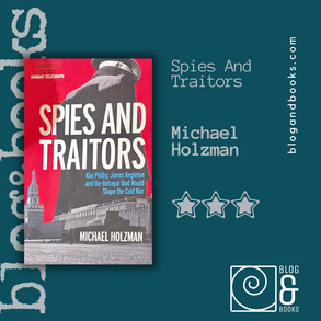 Copy of Spies and Traitors lying on drak grey material
