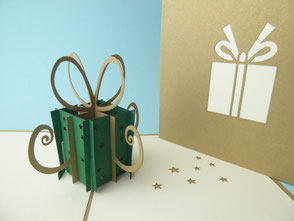 Carte pop-up cadeau de noël vert avec un ruban or