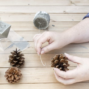 Wire the pine cones to the concrete base to let them float PASiNGA tutorial