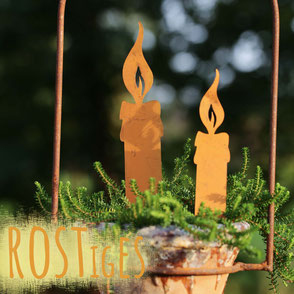 Gartenstecker in Form eines Vogels in Rostoptik in eine Minze-Pflanze gesteckt. Bild hat eine orangene Aufschrift "Rostiges". 