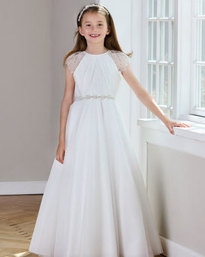 Elegant first holy communion dress with matching accessories for girls, available at our boutique near Ramstein Air Base.