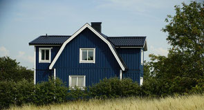 Holzhaus Fertighaus mit Mansarddach