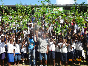 Enthusiastic children with seedlings before planting