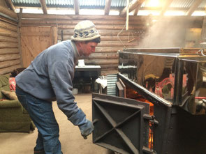 Scott getting the fire going this afternoon.