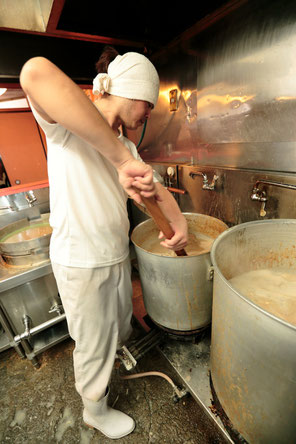 Soup making scene at a Japanese ramen shop