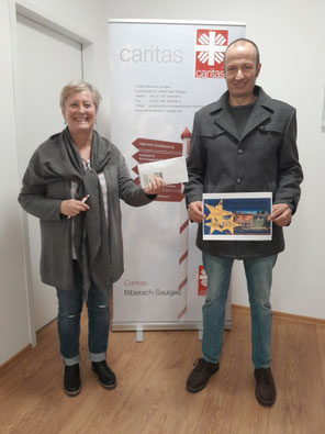 Caritas A. Hehnle und Organisator M. Zimmermann
