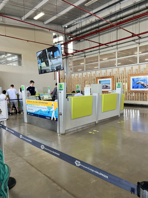 Desk at GPS Airport where you will pay Galapagos National Park Entrance Fee