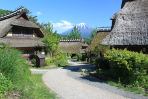 An old Japanese farmhouse overlooking Mt. Fuji