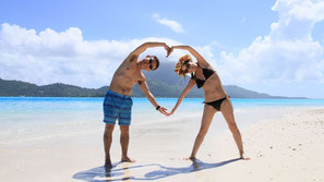 Nice view of Mt. Otemanu and crystal blue Lagoon from the white sand beach of motu of Bora Bora