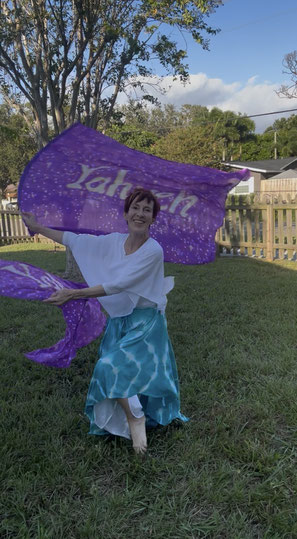 the name, Yahweh on field of stars and purple background