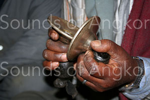 Unlinked cymbals with handles used to accompany devotional singing bhajan. Bhaktapur, Nepal.