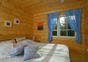 Schlafen im Blockhaus - Holzhaus in Blockbauweise - Doppelhaus - Zweifamilienhaus