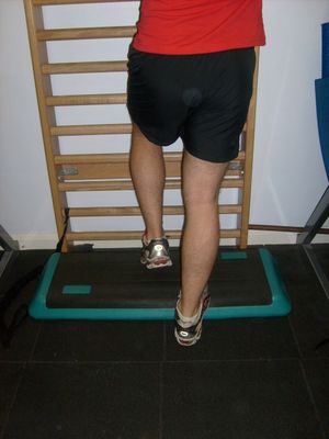 Lower your heel down with the painful leg