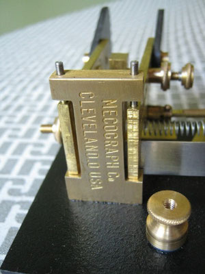 Key project #210 - scritta Mecograph