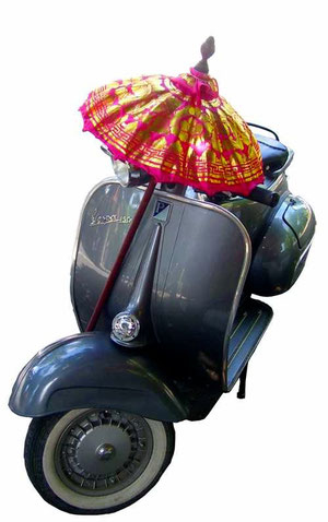 Vespa with temple-umbrella