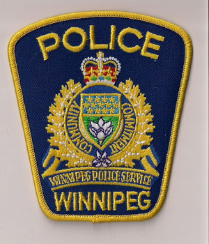 Police Winnipeg  (Ancien modèle / Obsolete)  (Fond bleu / Blue background)  (Neuf / New)  1x