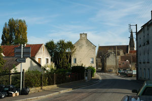 The D16 from Fel into Chambois, just before the Dives bridge some 50 yards ahead. Matchpoints are the shape of the roof on the the right and of course the churchtower (2011).
