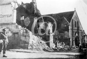 Saint Martin church, built in 1047, remains upright however rather damaged. 1944.
