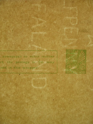 Newspaper wrapper watermarks,with the example showing the 'E' of Zealand damaged to almost becoming a 'F'