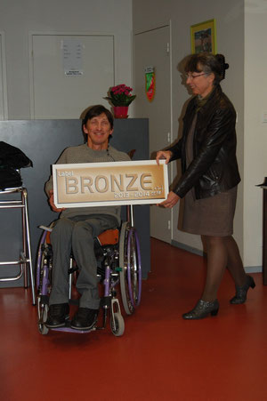 Dominique Grespier avec le label de bronze.