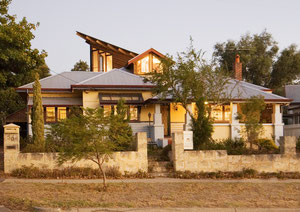 It was built in 1946 as a two-bedroom + sleep-out bungalow, with rear and side verandahs, and a separate wash-house. The house now has;  metal roof; reflecting heat stack-effect ventilation for coolin