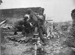 A US gun crew of the 254th Infantry Regiment manning a 57mm Anti Tank gun during the battle of Jebsheim.