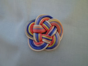 Broche con cola de raton
