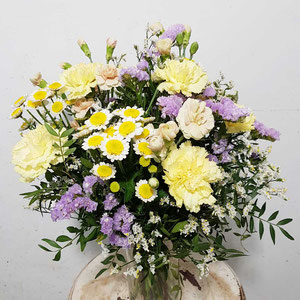summer flowers bouquet in yellow and lilac