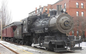 Old Engine and Railroad Cars on Exhibition