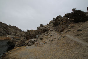 The location at Hot Creek in California was used for a scene in which John Wayne rolls down that hill in "Flame of Barbary Coast".