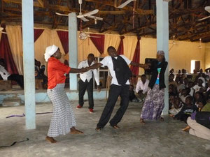 Students performing a drama in a local church