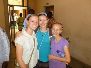 Hannah with her sisters - saying goodbye at the airport
