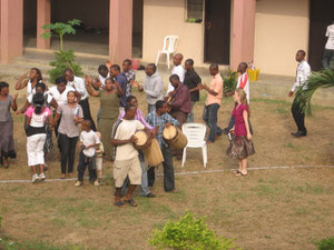 The DTS having their morning worship in the court yard