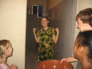 Hannah received a traditional Nigerian birthday bath. You get a bucket of water poured over you and baby powder rubbed on your face. Hannah was spared the baby powder.