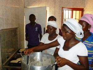 Cindy taught some students how to make pancakes & also how to bake a birthday cake.
