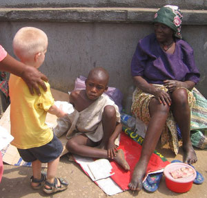 Elijah giving a meal to a young boy