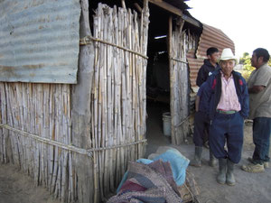 claro in front of his old house