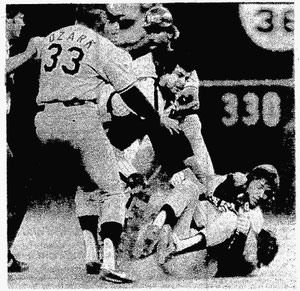 Bill Russell goes after Tug McGraw after being hit by a pitch in the 9th inning.