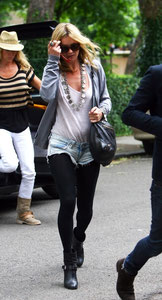Kate Moss arriving home along with ex-atomic Kitten Jenny Frost. London UK