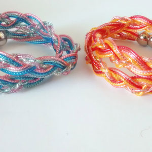 ~braided glittery bracelets in blue and red~