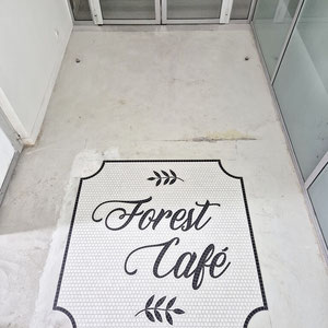 Tapis enseigne commerce mosaïque